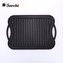 Preseasoned cast iron reversible griddle pan for baking or BBQ